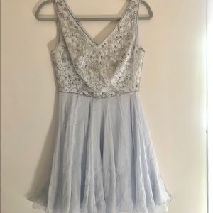 Fancy light blue dress with decoration